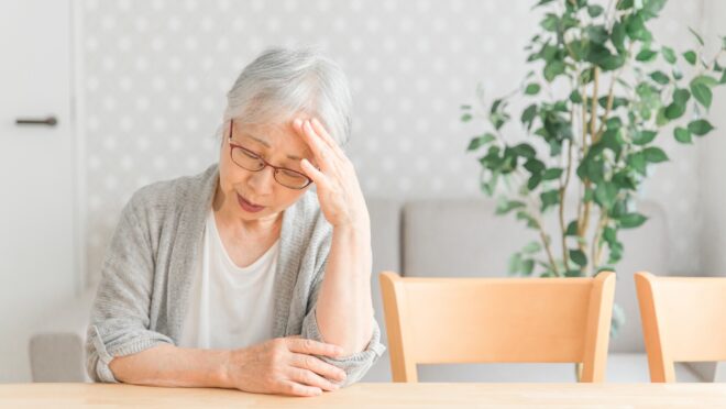 体調が優れない女性