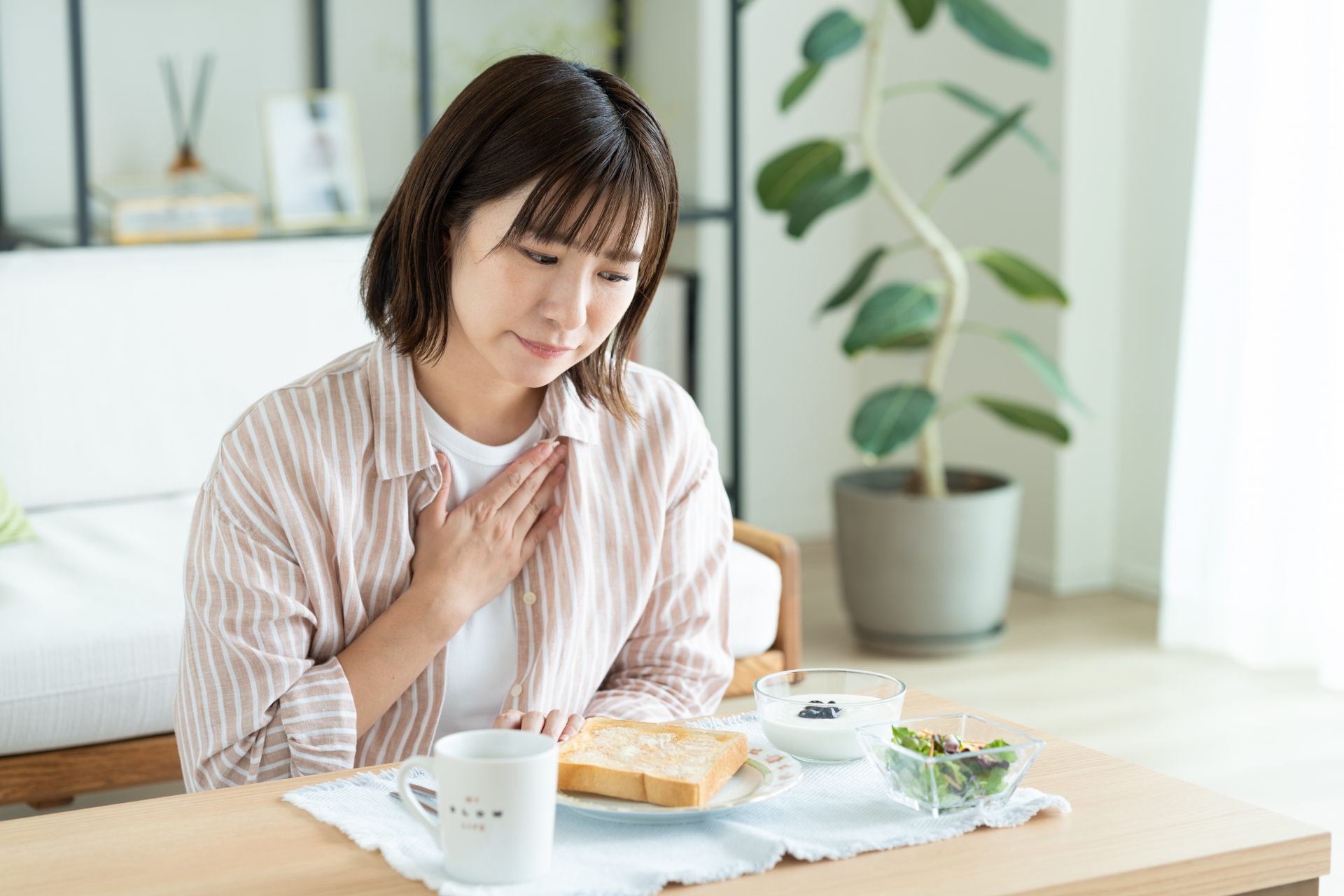 食欲不振の女性