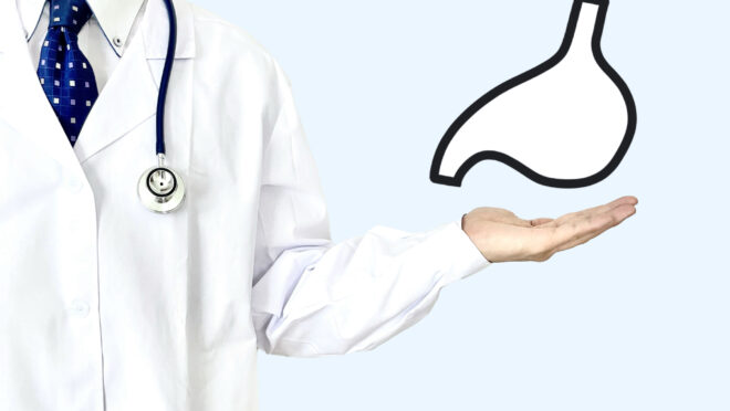 胃のイラストと医者